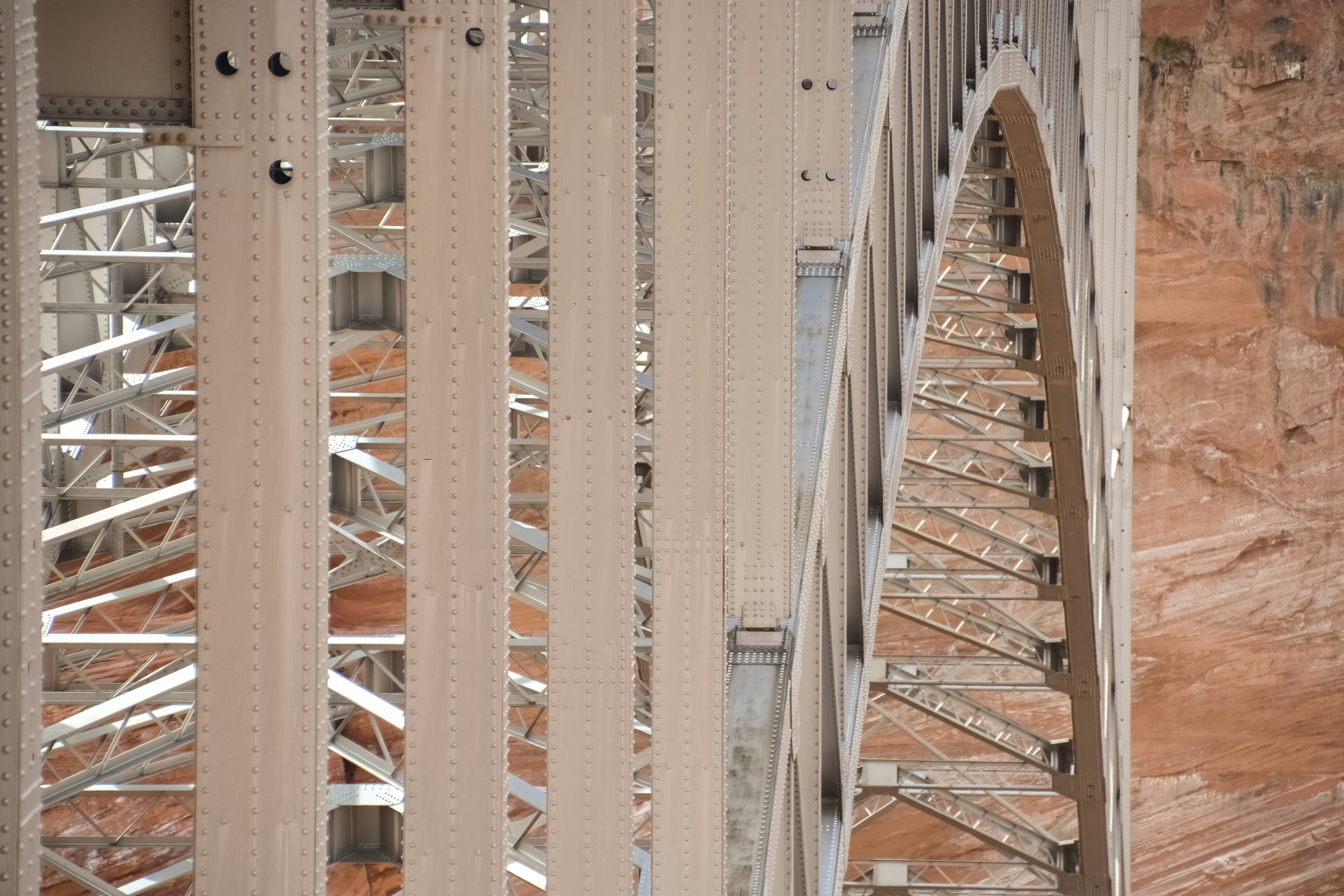 white and brown metal bridge